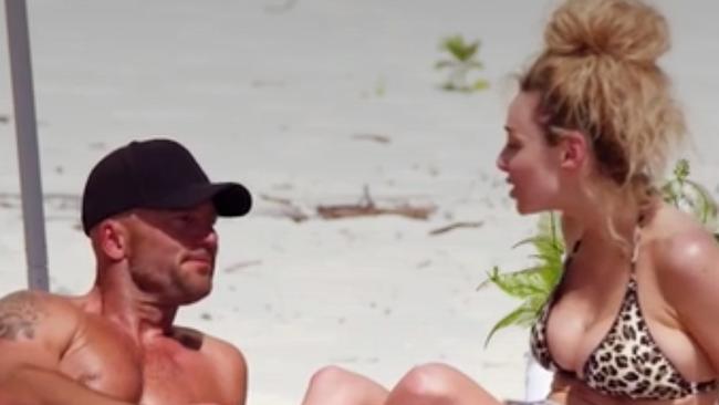 Mike and Heidi having a ‘conversation’ on the beach. Picture: Channel 9