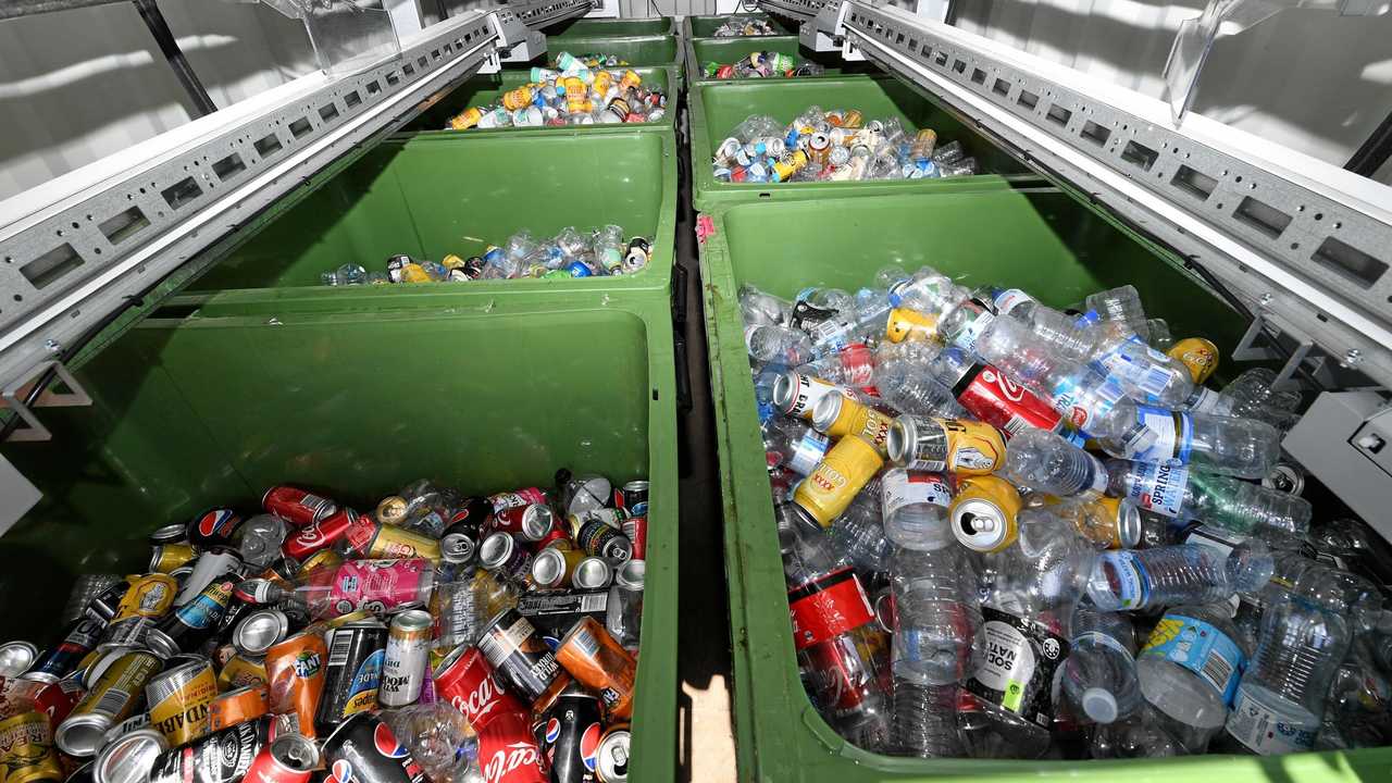 Deposited bottles are stacked into bins at the rear of the 'Return and Earn' recycling station at the BP service station, Chinderah Bay Drive, Chinderah. Picture: Tweed Daily News