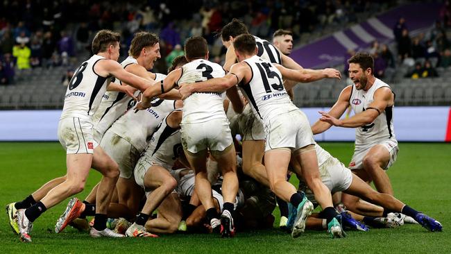 Carlton players celebrate Jack Newnes’ matchwinning goal after the siren against Fremantle. Picture: Will Russell/AFL Photos via Getty Images