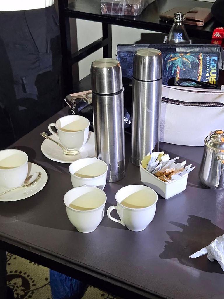 The drinks left in the hotel rooms where six bodies were found dead at a hotel in Bangkok. Picture: AFP.