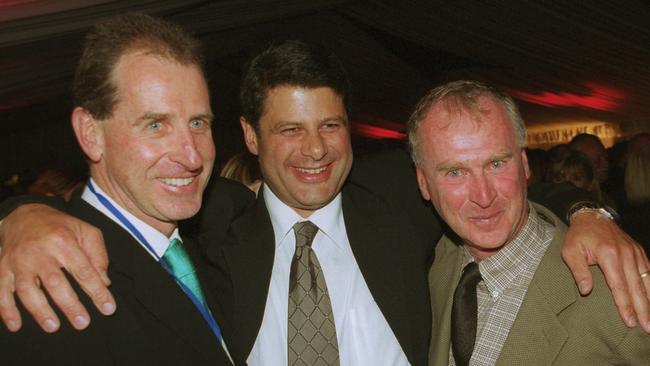 Former premier Steve Bracks flanked by Andrew Buxton (left) and Michael Buxton   at the opening of Docklands’ NewQuay precinct in 2002.