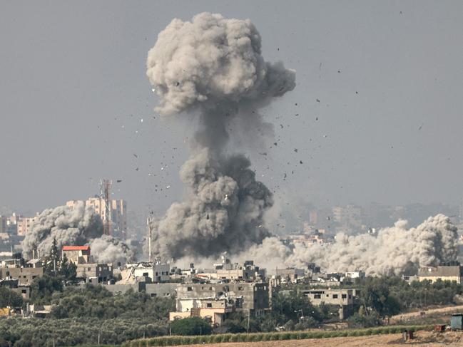 Smoke and debris ascending over the northern Gaza Strip following an Israeli strike. Picture: AFP