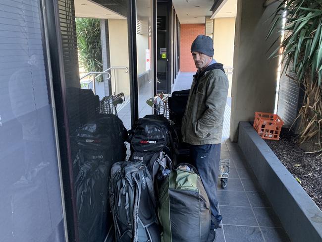 Jonathan McKinnon with all his belongings on the spot he slept in Coburg North.