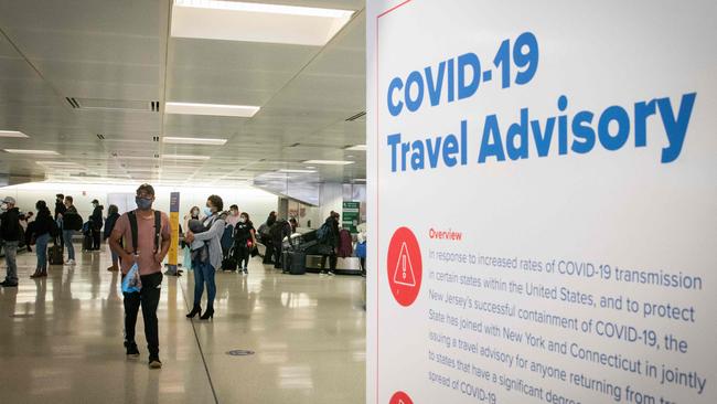 Australians need incentives — like the possibility of international travel resuming — to ensure high vaccination targets are reached. Picture: Kena Betancur / AFP