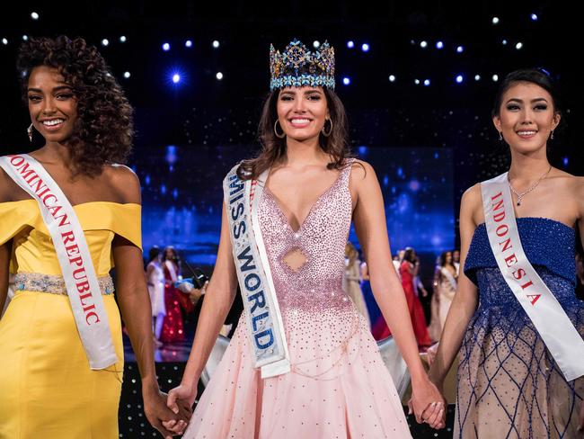 First runner up Miss Dominican Republic Yaritza Miguelina Reyes Ramirez ; Miss World 2016 Stephanie Del Valle of Puerto Rico; and second runner up Miss Indonesia Natasha Mannuela stand together after Del Valle’s win in the Miss World 2016 pageant at the MGM National Harbor December 18, 2016 in Oxon Hill, Maryland. Picture: AFP