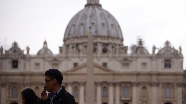 A man smokes a cigarette at St Peter’s Square. Picture: Filippo Monteforte/AFP