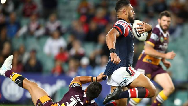 SYDNEY, AUSTRALIA — SEPTEMBER 08: Alex Glenn of the Broncos tackles Isaac Liu of the Roosters during the NRL Qualifying Final match between the Sydney Roosters and the Brisbane Broncos at Allianz Stadium on September 8, 2017 in Sydney, Australia. (Photo by Mark Kolbe/Getty Images)