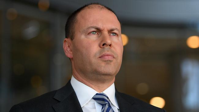 Treasurer Josh Frydenberg has blasted two of the big four banks for failing to pass on interest rate cuts in full.