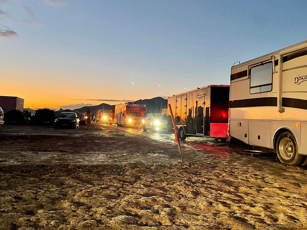 Vehicles line up to leave the site of the annual Burning Man Festival in Nevada’s Black Rock. Picture: AFP