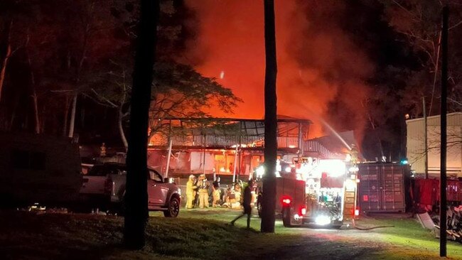 QFES and Bonogin Valley Rural Fire Brigade have been fighting a house fire on Gilston Rd at Gilston. Picture: Bonogin Valley Rural Fire Brigade/Facebook