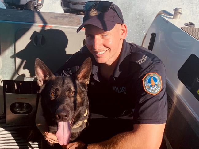 Senior COnstable Harry Vincent with Patrol Dog Quake who died this week after a short illness. Picture: NT Police