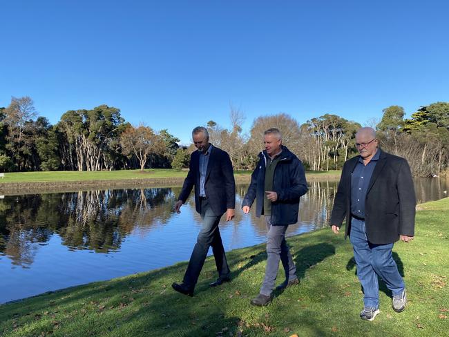 Kentish Mayor Tim Wilson, Acting Premier Jeremy Rockliff and Latrobe Acting Mayor Graeme Brown at Bells Parade, Latrobe, which was “completely covered in water” during 2016’s devastating floods. Picture: Supplied