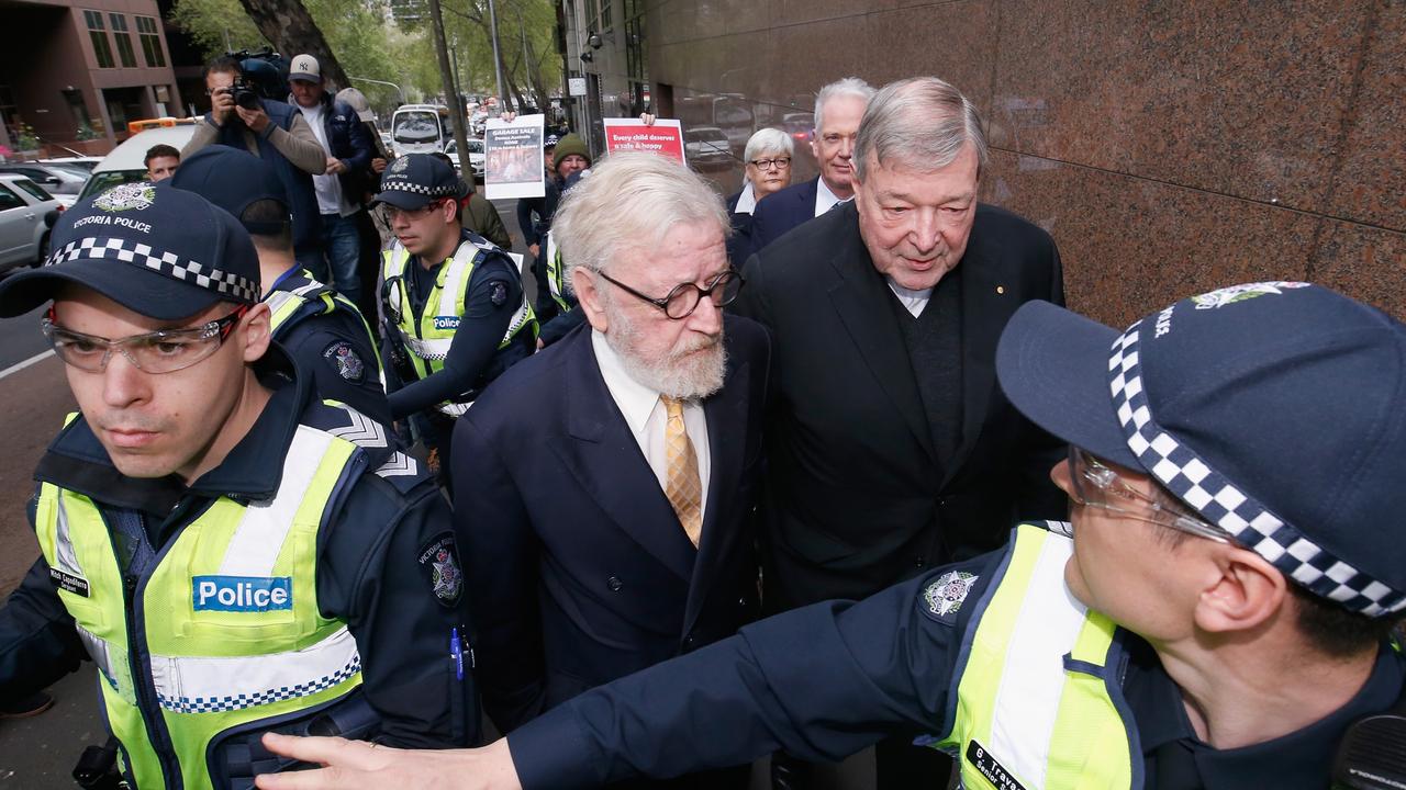 Pell with his barrister Robert Richter outside Melbourne Magistrates’ Court in October 2017. Picture: Getty