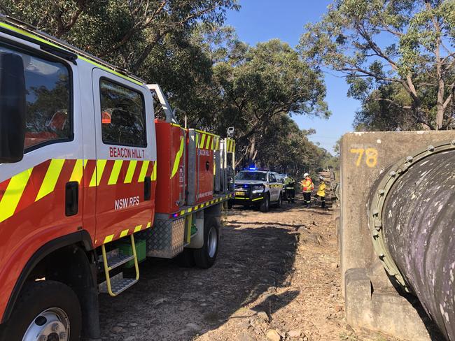 Multiple brigades were called in to fight several suspicious fires in bushland on the northwestern end of Manly Dam Reserve. Picture: Jim O’Rourke