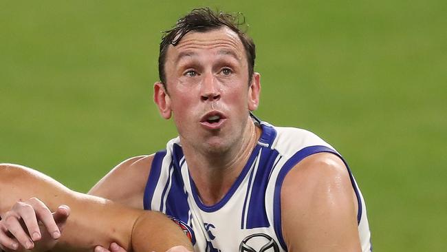 PERTH, AUSTRALIA - APRIL 24: Sean Darcy contests a ruck with Todd Goldstein during the 2021 AFL Round 06 match between the Fremantle Dockers and the North Melbourne Kangaroos at Optus Stadium on April 24, 2021 in Perth, Australia. (Photo by Will Russell/AFL Photos via Getty Images)