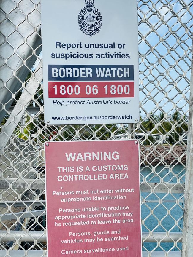 Border Watch warnings at the entrance to the Cullen Bay wharf boat docking site. PICTURE Gary Shipway