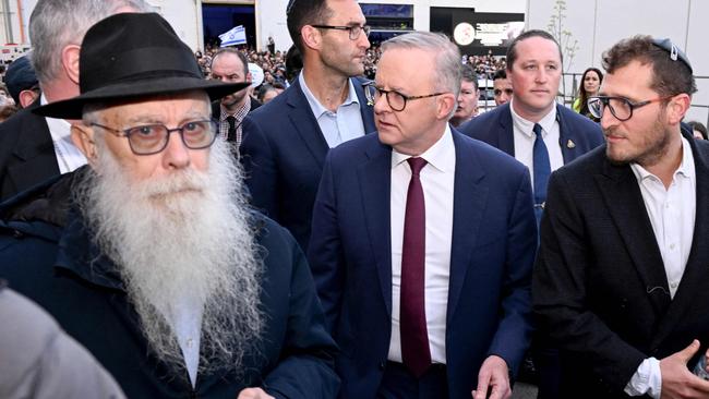 Prime Minister Anthony Albanese with members of Melbourne’s Jewish community during a vigil on the first anniversary of the Israel-Hamas conflict, on October 7. Picture: AFP