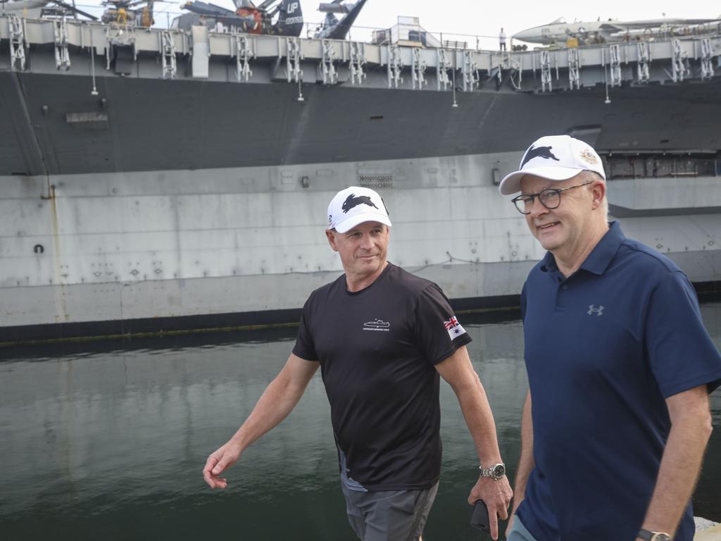 PM Anthony Albanese and Vice Admiral Mark Hammond walk along Tuna Harbor Park next to the USS Midway Museum in San Diego, California. Picture: Sandy Huffaker