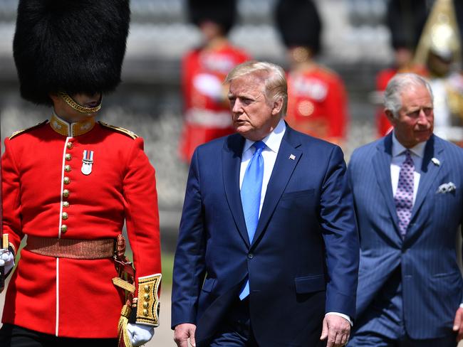 The US President inspects a Guard of Honour with Prince Charles. Picture: Getty Images