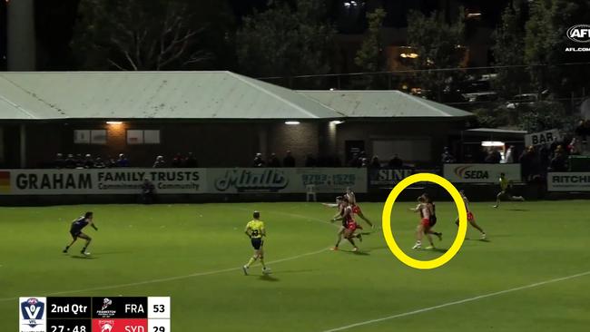 Luke Parker delivers off the ball hit in the VFL on Friday night. Credit: AFL