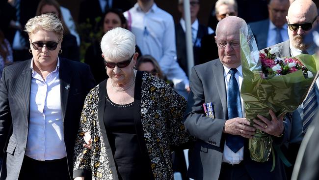 The Eyre family lay a wreath during the memorial service. Picture: Nicole Garmston