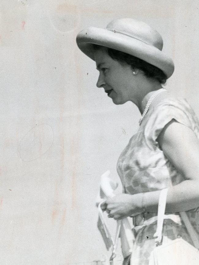 The Queen wore this aquamarine Breton sailor hat of straw banded in sapphire velvet for the civic reception at the Adelaide Town Hall.