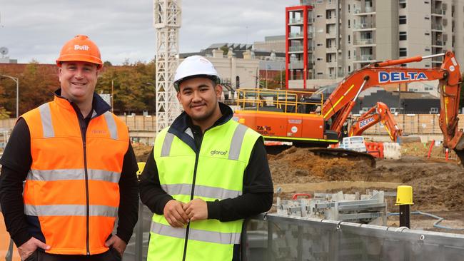 Pre-employment participant Ali Ahmed, right, with his mentor Nick Powell in front of works being undertaken to build the Nyaal Banyul Geelong Convention and Event Centre. Picture: Alison Wynd.