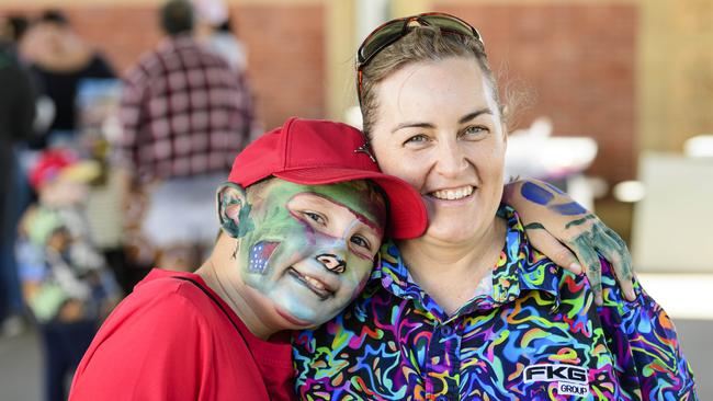 Kelly Sutton with son Logan Sutton at Sadie's Day Out, a special community event to celebrate the life of five-year-old crash victim Sadie, held at Cambooya State School, Saturday, June 7, 2025. Picture: Kevin Farmer
