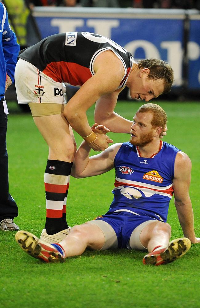 Brendon Goddard and Adam Cooney after a St Kilda-Bulldogs preliminary final. The clubs met in prelims in 2009 and 2010.