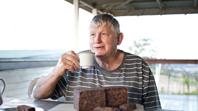 Geoff Beattie enjoys a cuppa with his rich dark fruit cake. Picture: Eddie Safarik.