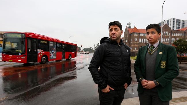 Peter Boutros and his 15-year-old John at the Darcy Rd and Hawkesbury Rd intersection where traffic is expected to worsen if the school population soars. Picture: John Fotiadis