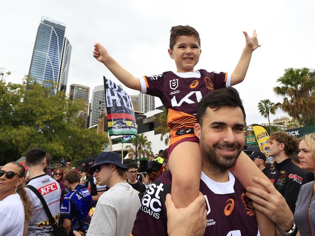 Peter Nicolaou and son Nicholas 4 attend the NRL Fan day at Circular Quay in Sydney ahead of SundayÃs NRL Grand Final against Penrith. Pics Adam Head