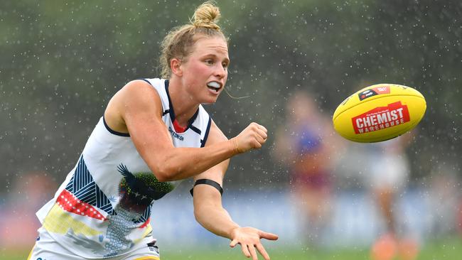 Adelaide’s Dayna Cox fires off a handball against Brisbane in round one of the 2020 AFLW season. Picture: AAP Image/Darren England