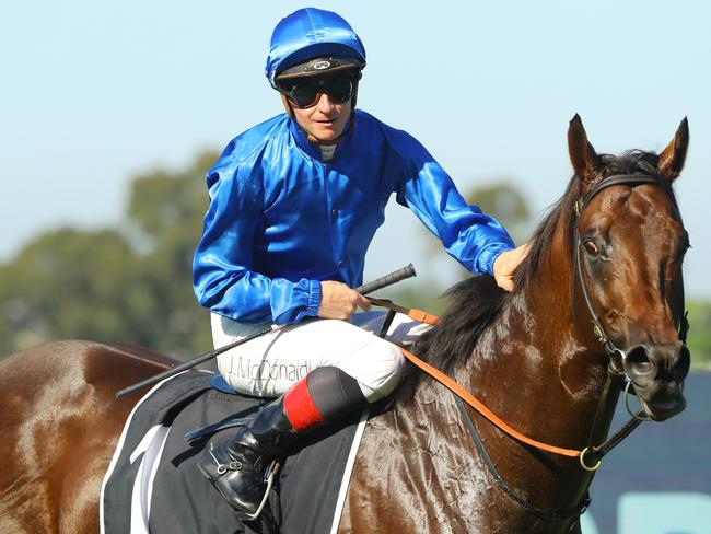 SYDNEY, AUSTRALIA - MARCH 18: James Mcdonald riding Anamoe wins Race 7 The Agency George Ryder Stakes during the Longines Golden Slipper Day - Sydney Racing at Rosehill Gardens on March 18, 2023 in Sydney, Australia. (Photo by Jeremy Ng/Getty Images)