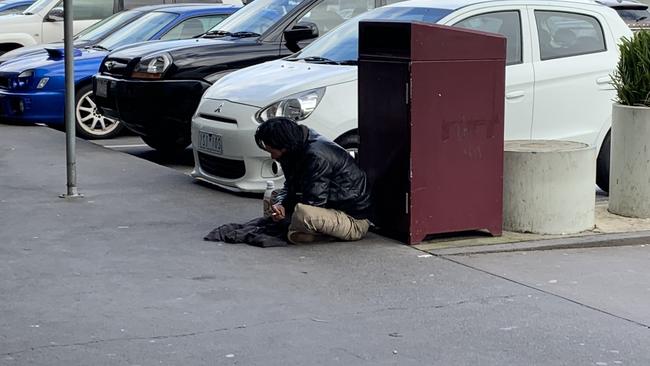 A man seen begging outside Coles on Princes Hwy, Dandenong.