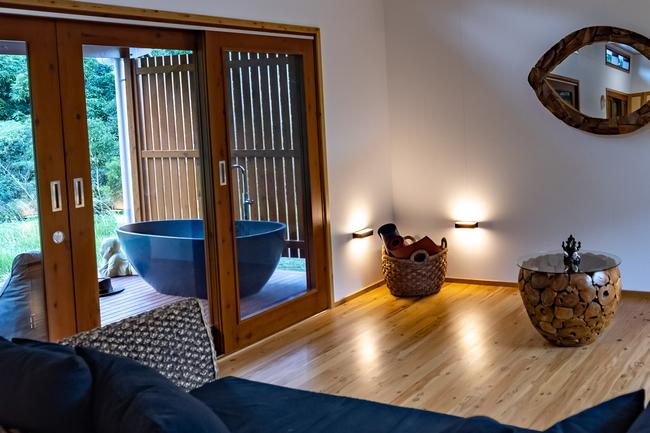 The Mount Jukes Eco Resort, built from scratch by yoga aficionado David Deakin, holds glamping tents and a half-moon shaped house that face Mt Jukes and Mr Deakin says the â€œenergyâ€ of the property has to be experienced to be understood. Picture: Contributed