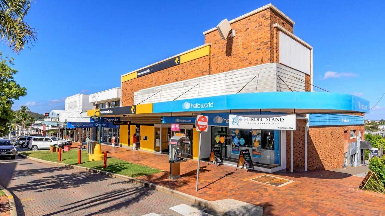 LJ Hooker has listed 81 Goondoon St, where Commonwealth Bank, Uber Hair and Hello World are, for sale.