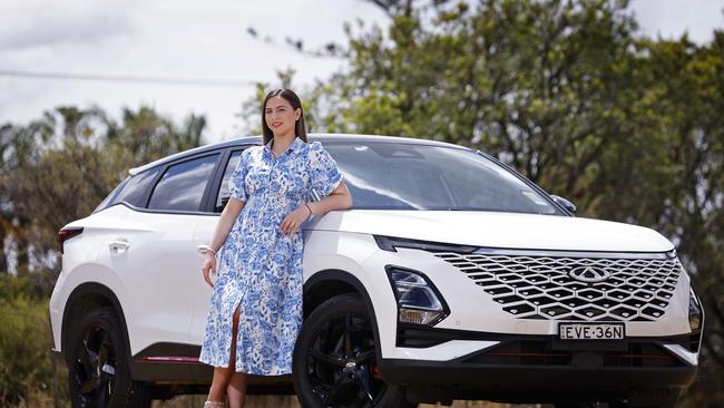 Kayla Sacco with her Chery Omoda 5 car, built in China, at her Rossmore home. Picture: Sam Ruttyn