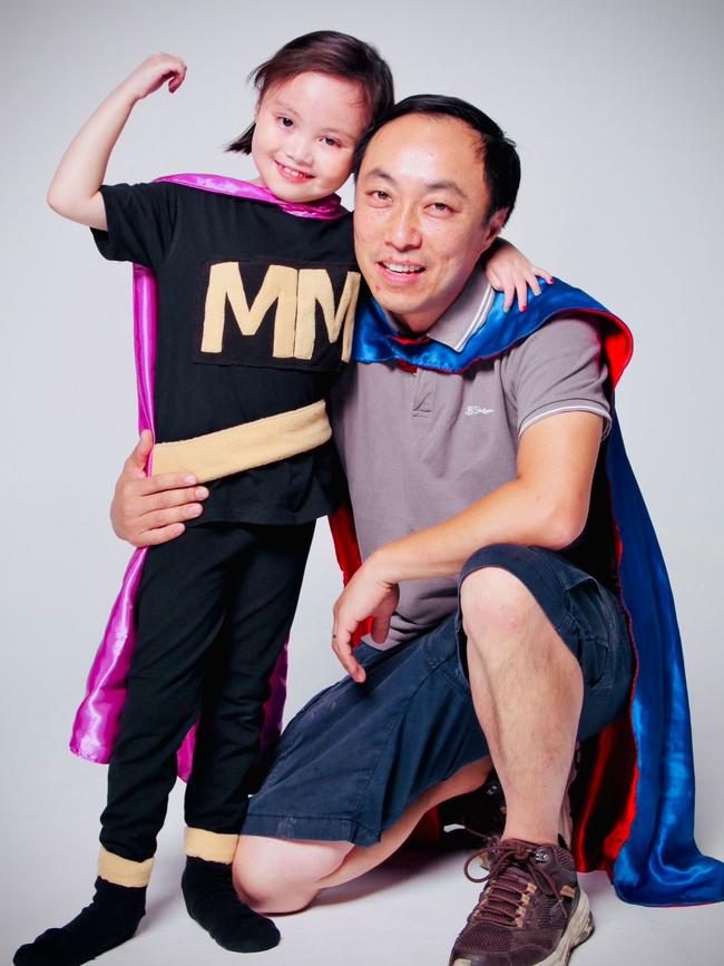 Mighty Maddy Suy with her father Alan.