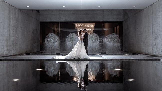 Adelaide and Roberto Hernandez held their wedding reception in the Queensland Art Gallery. Picture: Evernew Studio