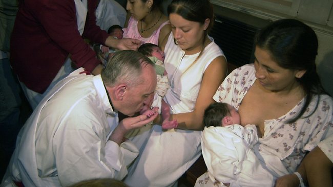 The then archbishop of Buenos Aires, Jorge Bergoglio, elected on March 15, 2013 as Pope Francis, performs the footh bath ceremony in Buenos Aires, on March 24, 2005.. AFP / Daniel Vides