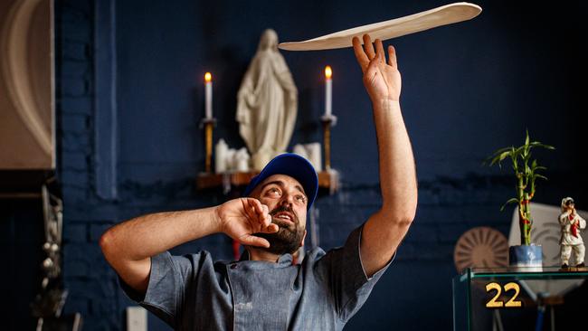 Ettore Bertonati tosses pizza dough at his restaurant Madre in Adelaide. Picture: Matt Turner