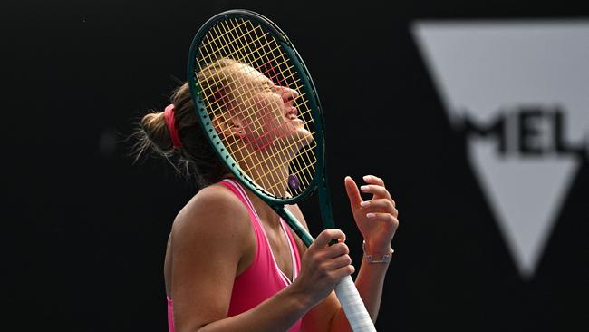 Ukraine's Marta Kostyuk reacts after a point against Russia's Elina Avanesyan during their women's singles match on day six of the Australian Open. Picture: Anthony Wallace/AFP.