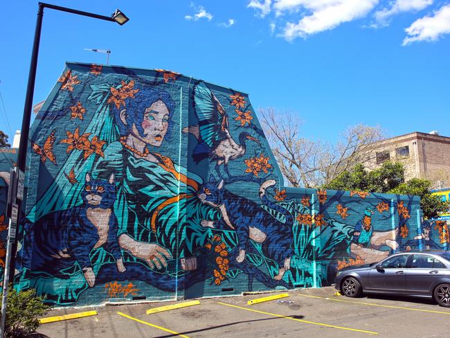 The walls of the Newtown Lennox St carpark terrace house. The mural is called ‘The Promise’. Picture: Nick Eagar