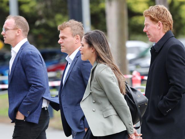 Former Cats star Cameron Ling and others arrive for Nathan Templeton’s funeral service. Picture: Alan Barber