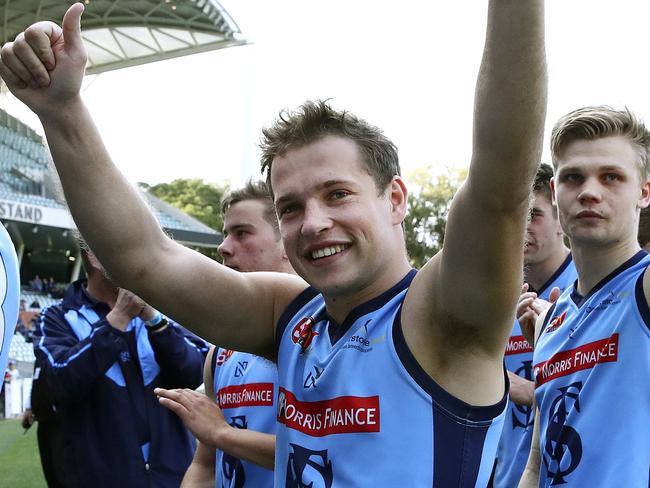 SANFL - Preliminary Final - Sturt v Eagles at Adelaide Oval. Guy Page and Steven SLimming wave to the crowd as they walk off after the win. Picture Sarah Reed