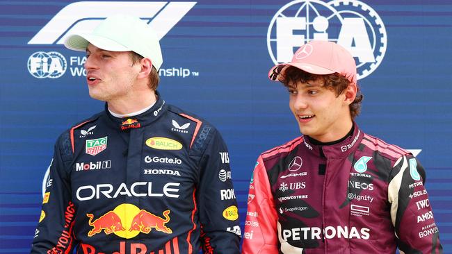 MIAMI, FLORIDA - MAY 03: Pole position qualifier Max Verstappen of the Netherlands and Oracle Red Bull Racing and Third placed qualifier Andrea Kimi Antonelli of Italy and Mercedes AMG Petronas F1 Team looks on during qualifying ahead of the F1 Grand Prix of Miami at Miami International Autodrome on May 03, 2025 in Miami, Florida.   Mark Thompson/Getty Images/AFP (Photo by Mark Thompson / GETTY IMAGES NORTH AMERICA / Getty Images via AFP)