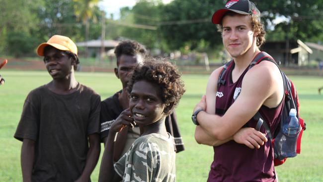 Andy McGrath with students from the Tiwi Islands. Picture: NATALIE MacGREGOR