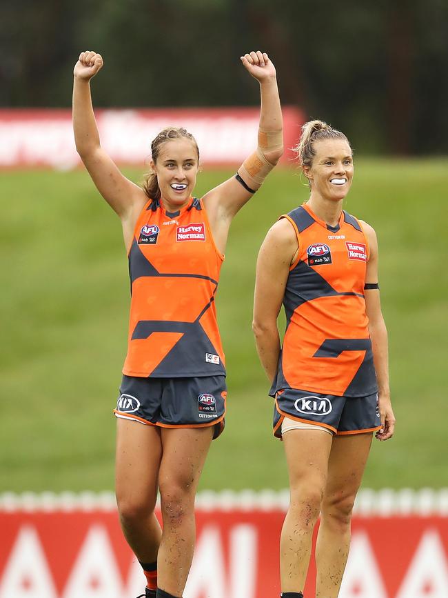 Georgia Garnett and Eleanor Bennetts soak up the final siren.