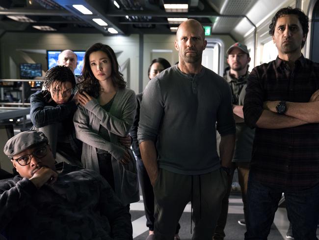 Page Kennedy, Ruby Rose, Li Bingbing, Jason Statham and Cliff Curtis draw short straws to see who will be eaten first. Picture: Warner Bros Entertainment via AP